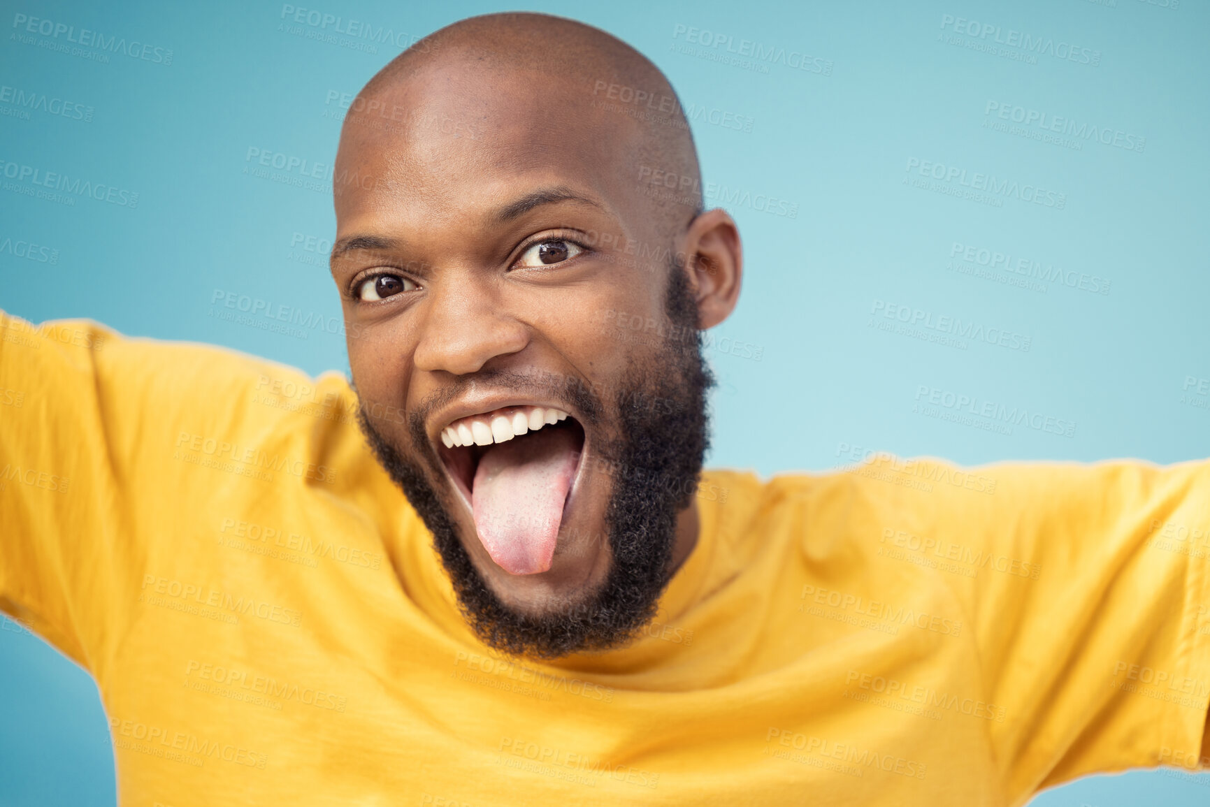 Buy stock photo Black man, portrait or tongue on blue background, isolated mockup or wall backdrop mock up for comic, silly or emoji expression. Happy, funny face or goofy student with fashion, trend or cool clothes