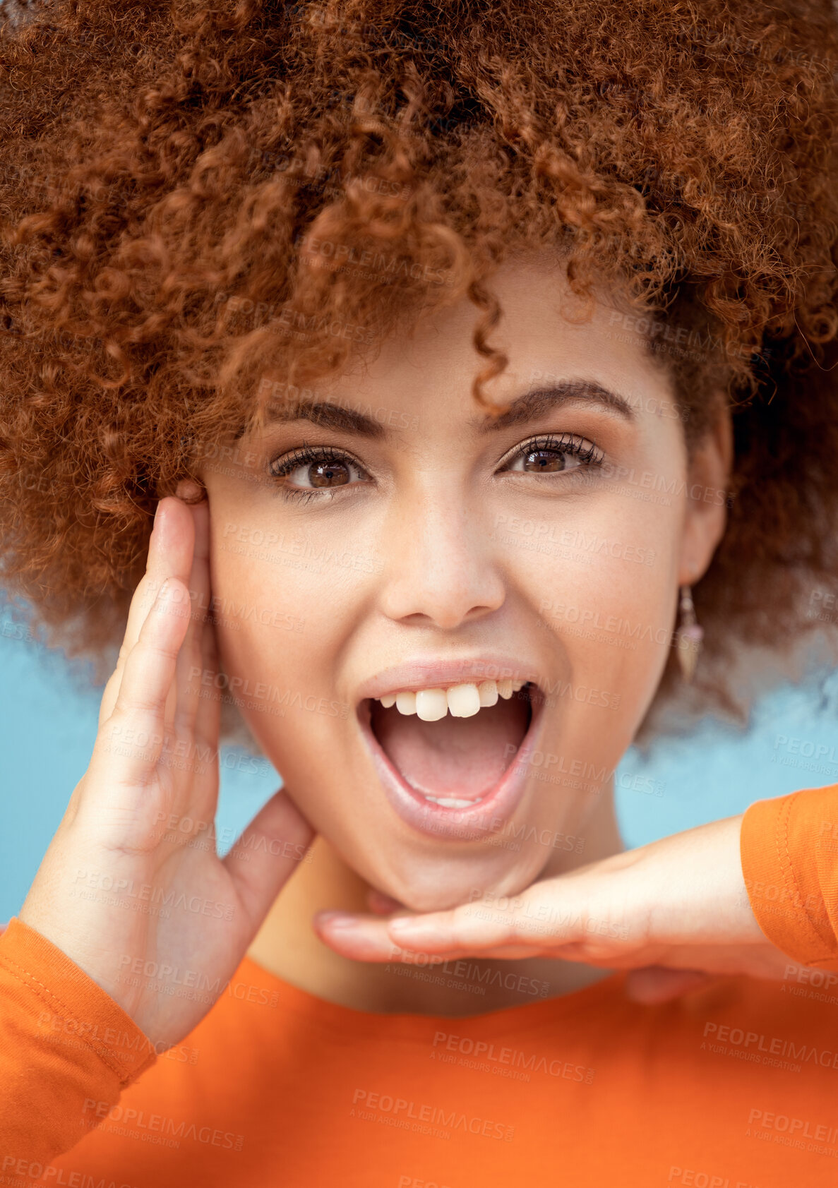 Buy stock photo Wow, surprise and portrait of a woman with hands for frame isolated on a blue background. Smile, crazy and face of an African girl with a comic facial expression, excited and funny on a backdrop