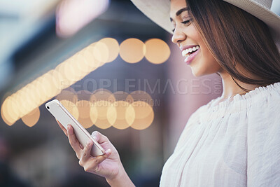 Buy stock photo Woman, phone and smile for social media with in the city for communication, travel or conversation. Happy female smiling for discussion, traveling or online 5G connection on smartphone in urban town