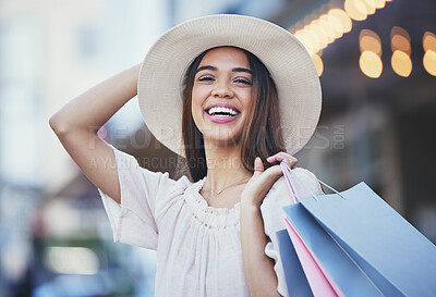 Buy stock photo Woman, shopping and portrait smile in the city carrying bags for discount, deal or purchase. Happy female shopper smiling in joyful happiness for luxury, fashion gifts or sale in an urban town