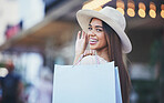Woman, shopping bag and portrait smile in the city carrying bags for discount, deal or purchase. Happy female shopper smiling in joyful happiness for luxury, fashion gifts or sale in an urban town