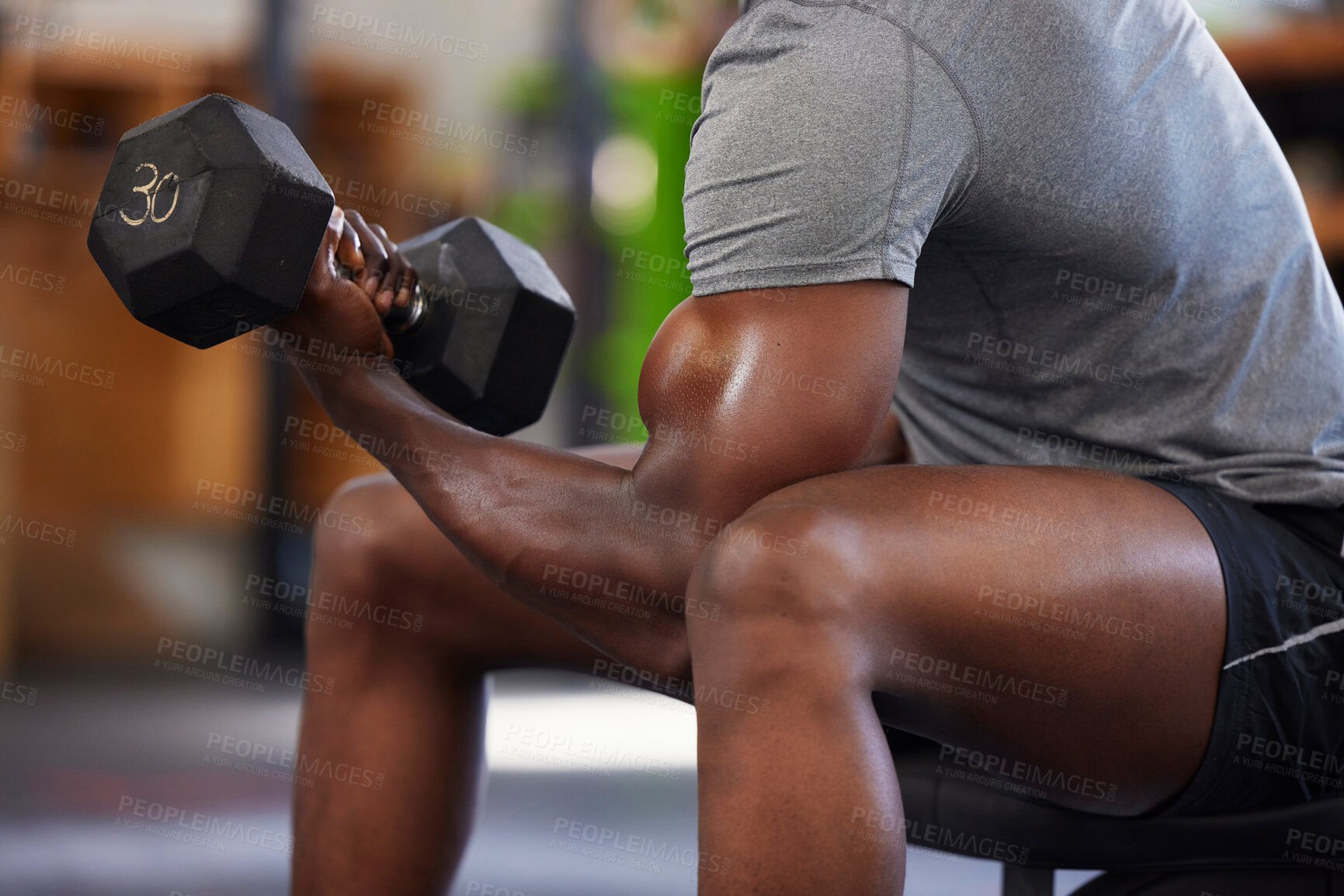 Buy stock photo Dumbbell, power and black man doing a workout in the gym for intense arm strength training. Sports, motivation and strong African male bodybuilder doing a exercise with weights in a sport center.