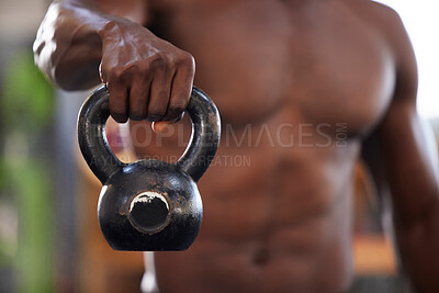 Buy stock photo Kettlebell in hand, black man and fitness in gym, bodybuilder with muscle training and weightlifting exercise. Fist, strong person and bodybuilding for power and strength, health and active lifestyle