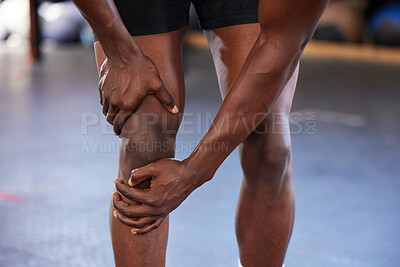 Buy stock photo Hands, knee pain and man at gym with injury, hurt or sore during fitness, training and exercise on mockup space. Sports, accident and legs of guy with muscle, arthritis or inflammation during workout