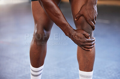 Buy stock photo Knee pain, hands and man at gym with injury, hurt or sore during fitness, training and exercise on mockup space. Sports, accident and legs of guy with muscle, arthritis or inflammation during workout