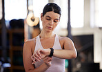 Fitness, smartwatch and woman in gym for training, workout or exercise results, monitor or progress update, Check, timer and goals of athlete or sports person with technology for health and wellness