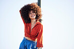 Woman, happy and outdoor portrait for fashion on a blue sky background with summer mock up space. Face of beauty model person with natural hair, happiness and unique style for freedom mindset
