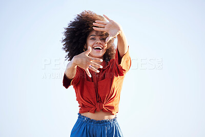 Buy stock photo Woman, portrait and hands over face outdoor for fashion on a blue sky background with summer mockup space. Beauty model person with natural hair, happy smile and unique style for freedom mindset