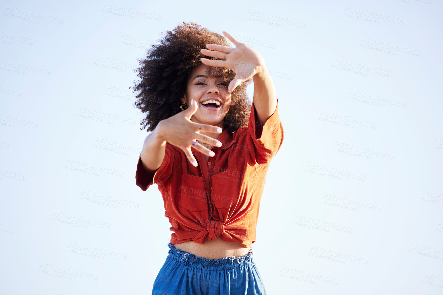 Buy stock photo Woman, portrait and hands over face outdoor for fashion on a blue sky background with summer mockup space. Beauty model person with natural hair, happy smile and unique style for freedom mindset