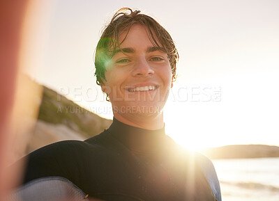 Selfie, surf and beach with a sports man outdoor in nature on the sand by the sea or ocean for recreation. Portrait, face or surfing with a male athlete posing for a photograph outside in the morning