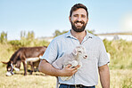 Farmer, portrait or baby lamb on livestock agriculture, countryside environment or nature in sheep growth management. Happy, farming or man and mutton animals, pet safety or veterinary life insurance