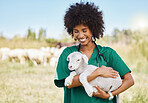 Veterinary, farm and woman holding sheep on livestock field for medical animal checkup. Happy, smile and female vet doctor doing consultation on lamb in agro, sustainable and agriculture countryside.