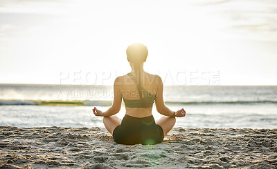 Buy stock photo Woman, yoga and meditation on the beach sunset for spiritual wellness, zen or workout in the outdoors. Female yogi relaxing and meditating for calm, peaceful mind or awareness by the ocean coast 