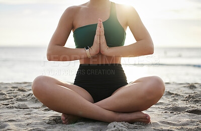 Buy stock photo Woman, yoga and meditation on the beach for spiritual wellness, zen or workout in the outdoors. Female yogi relaxing and meditating for calm, peaceful mind or awareness in sunset by the ocean coast