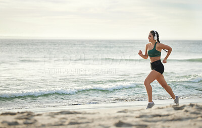 Buy stock photo Woman listening to music, running on beach and morning cardio routine for healthy lifestyle in California. Fitness workout by sea, young athlete with headphones and sports exercise in summer mockup