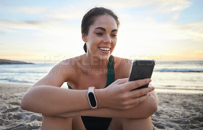 Buy stock photo Beach, relax and happy woman on a phone browsing on the internet, online or a mobile app. Happiness, smile and female networking or scrolling on social media with a cellphone by the ocean at sunset.