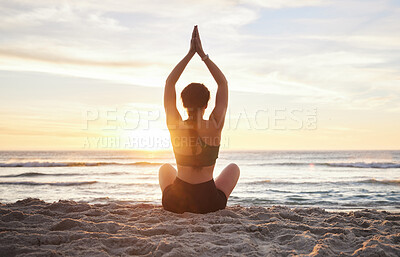 Buy stock photo Woman, yoga and meditation on the beach sunset for zen workout or spiritual wellness outdoors. Female yogi relaxing and meditating in sunrise for calm, peaceful mind or awareness by the ocean coast