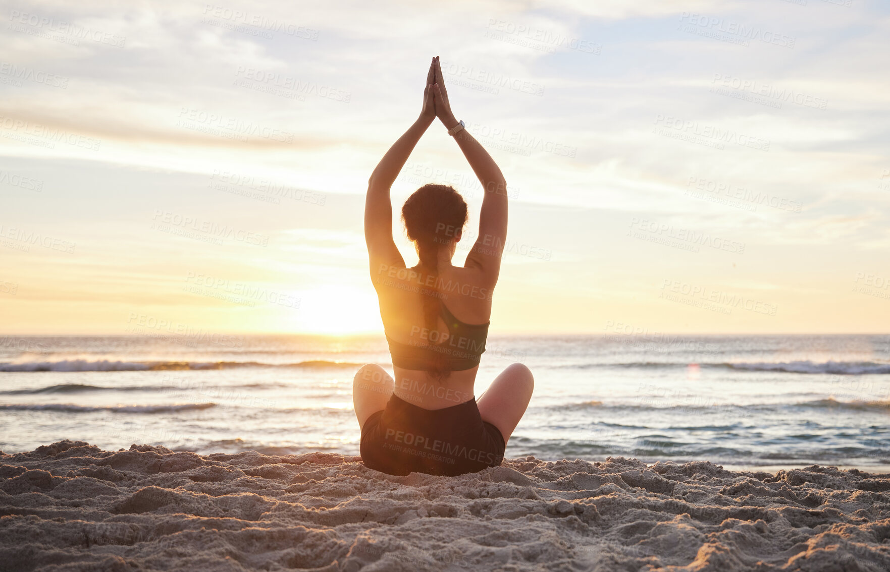 Buy stock photo Woman, yoga and meditation on the beach sunset for zen workout or spiritual wellness outdoors. Female yogi relaxing and meditating in sunrise for calm, peaceful mind or awareness by the ocean coast