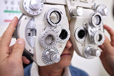 Buy stock photo Eye care, exam and vision test machine with patient and doctor at optometry consultation for lens or frame. Hands of man healthcare person with equipment for eyes and health insurance for eyewear