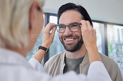 Buy stock photo Optometrist, glasses and man with smile in store for vision, eyesight and optical frames. Happy customer face, spectacles and prescription lenses for eye care test, consulting or retail shop services