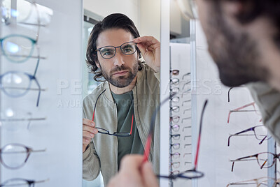 Buy stock photo Glasses choice, optometry and man in mirror, vision check and eye care for customer experience of store lens frame. Young client or person eyes healthcare, retail and shop test for optical wellness