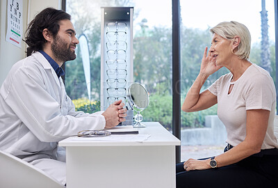 Buy stock photo Eye doctor, senior or woman consulting for eyesight advice at optometrist or ophthalmologist with medical aid. Customer talking or asking questions to check vision health with a trusted optician 