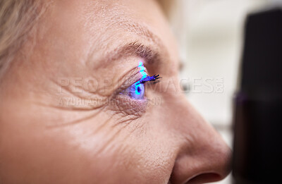 Buy stock photo Eye exam, vision or laser test for an old woman with a machine at optometry consultation for retina problem. Senior, patient or client with medical health insurance checking eyesight at optician