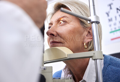 Buy stock photo Eye exam, vision or laser test for a woman with a machine at optometry consultation for retina problem. Senior, patient or mature client with medical health insurance checking eyesight at optician