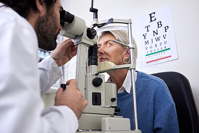 Buy stock photo Vision, machine exam and woman with an optometrist for a check, eye consultation and lens test. Healthcare, help and male optician with a senior patient to measure visual eyesight with equipment