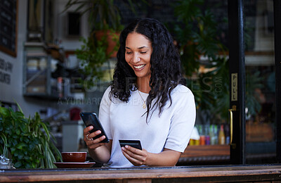 Buy stock photo Woman, phone and credit card with smile for ecommerce, online shopping or purchase at coffee shop. Happy female shopper on smartphone for internet banking, app or wireless transaction at indoor cafe