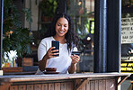 Woman, phone and credit card at coffee shop for ecommerce, online shopping or purchase. Happy female customer with smile on smartphone for internet banking, app or wireless transaction at indoor cafe