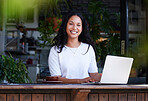 Cafe, portrait and woman typing on laptop for online project, email or sales report. Freelancer, remote worker and happy female with digital computer for writing, networking or planning at restaurant