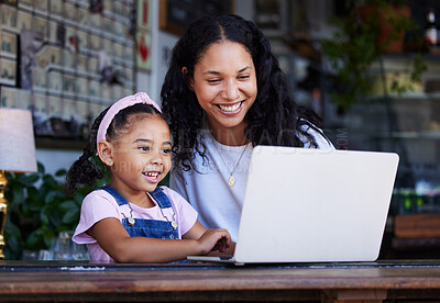 Buy stock photo Girl, learning and mother with laptop at cafe for education and development online. Family care, remote worker or happy woman teaching kid how to type on computer at restaurant, bonding or having fun