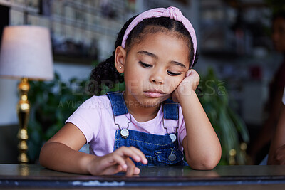 Buy stock photo Sad, bored and lonely kid in home, depressed or upset while thinking alone in house. Loneliness, depression and anxiety, stress or mental health of disappointed girl with negative facial expression.