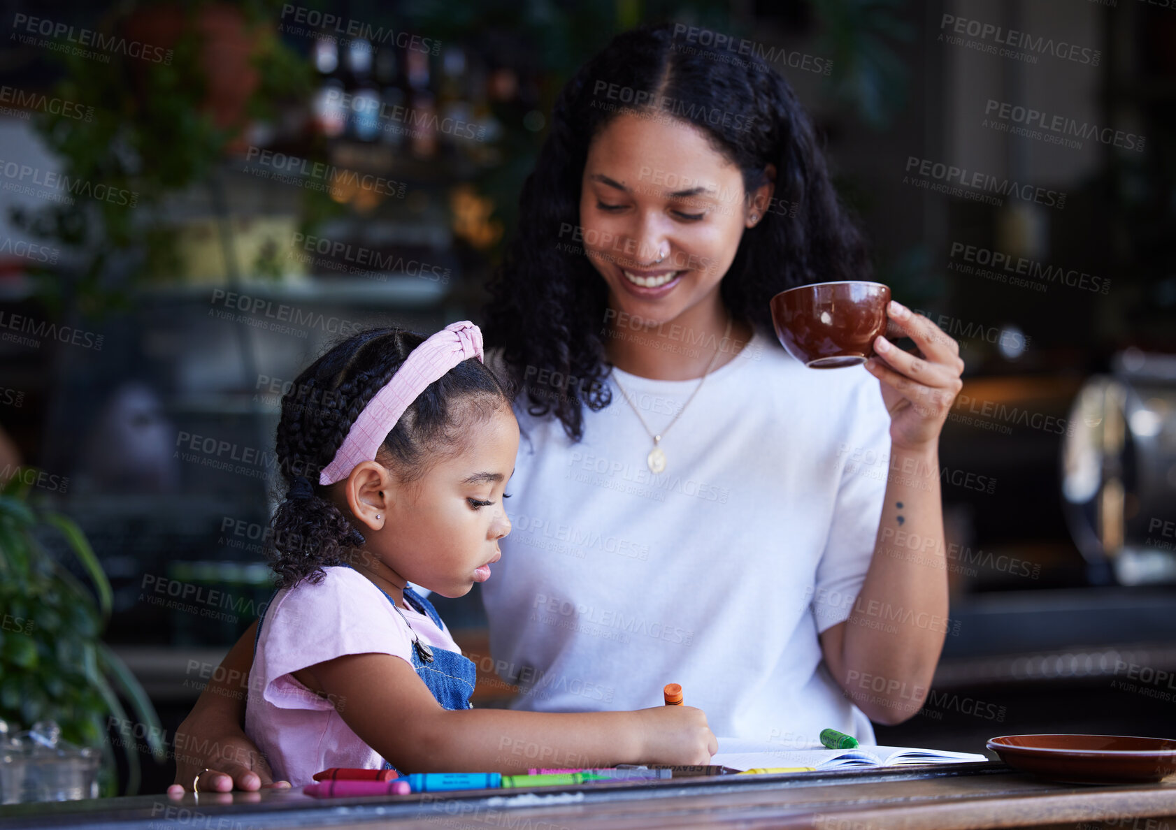 Buy stock photo Learning, drawing and girl with mother at cafe with books, studying and art education. Family care, love and mama teaching kid how to color with crayons, having fun and bonding together in restaurant