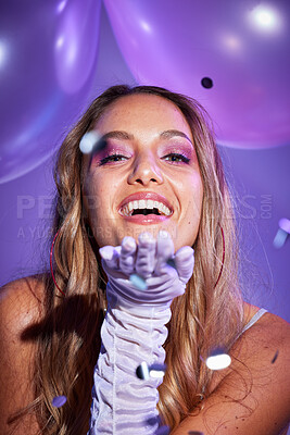 Buy stock photo Beauty, confetti and portrait of a happy woman in a studio with balloons for a birthday celebration. Happiness, cosmetic and female model blowing a kiss with makeup by purple background and aesthetic