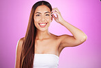 Hair care, happy and portrait of a woman with beauty isolated on a pink background in a studio. Smile, salon and hairdresser model showing a hairstyle from a spa for grooming and brunette style