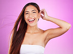 Hair care, cosmetics and portrait of a woman with a glow isolated on a pink background in a studio. Smile, salon and hairdresser model showing a hairstyle from a spa for grooming and brunette style