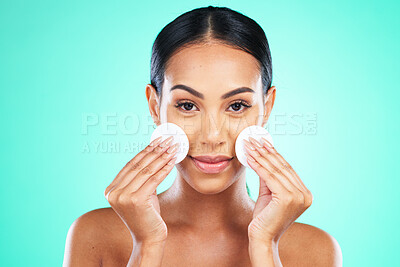 Buy stock photo Cotton pad and woman isolated on green background for face or facial cleaning in cosmetics product promotion. Young model or black person in portrait for beauty glow, makeup wipe and studio mockup
