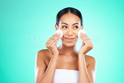Buy stock photo Beauty, cleaning and woman thinking with cotton for skincare isolated on a green background. Mockup, routine and model with promotion of facial pads to clean face of makeup, product and dirt