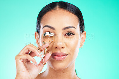 Buy stock photo Eyelash curler, beauty and portrait of woman on studio background. Female model curling lashes with metal tools for skincare, aesthetics and facial makeup product, face cosmetics and transformation 