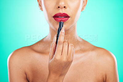 Buy stock photo Makeup, lipstick and beauty with a model black woman in studio on a green background for a cosmetic product. Cosmetics, mouth and lips with a female indoor to apply color for a beautiful aesthetic