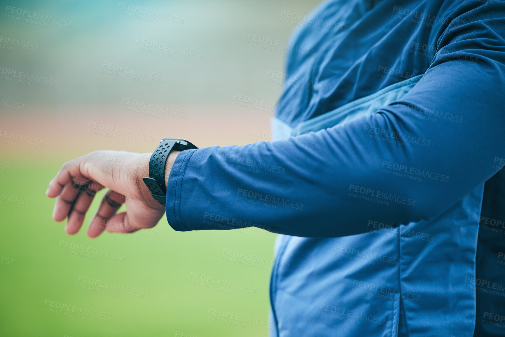 Buy stock photo Time, watch and hand of a fitness man watching fitness, run and training results on a smartwatch. Workout tech, sports and exercise app monitor outdoor with an athlete with blurred background 