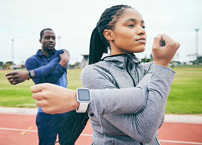 Buy stock photo Fitness, black couple and stretching arms for exercise, health and wellness at stadium. Winter sports, training or man and woman prepare and get ready to start workout, running or exercising outdoors