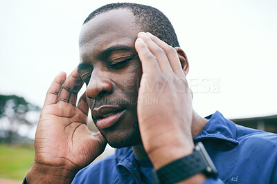 Buy stock photo Black man, stress and headache after exercise, workout or training practice outdoors. Sports wellness, fitness and mental health of tired male athlete with pain, burnout or migraine after running.