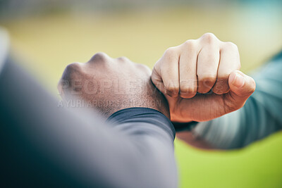 Buy stock photo Hands, fist bump and sports teamwork for motivation, collaboration and success. Team building, support and people, man and woman together for workout, training targets and exercise goals outdoors.