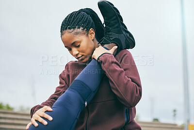 Buy stock photo Fitness, black woman and coach stretching legs for running exercise, workout or preparation at stadium. African American female mentor helping partner in warm up leg stretch for cardio or athletics