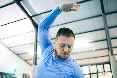 Buy stock photo Fitness, gymnastics and man stretching arms ready to start training, exercise and workout in gym. Sports, motivation and face of male athlete with focus for balance, body performance and competition
