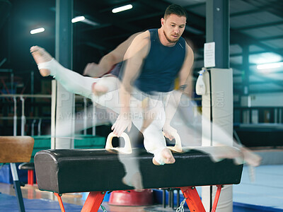 Gymnastics, fitness and man on balance beam for training, cardio and strength at gym. Athletic, male and acrobat practice speed, control and sport routine for muscle, power or endurance performance