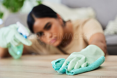 Buy stock photo Hand, cleaning and cloth with a woman housekeeper wiping a wooden furniture surface using disinfectant. Gloves, wipe and hygiene with a female cleaner in a home for housekeeping or sanitizing